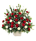 Red and White sympathy arrangement from Fields Flowers in Ashland, KY